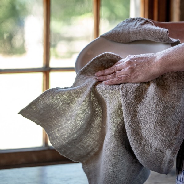 A linen dish towel woven by Madame Cyr